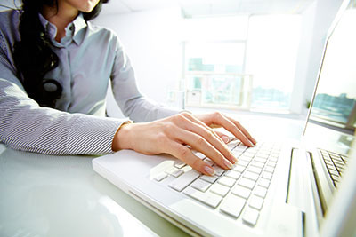 image of a woman on a computer